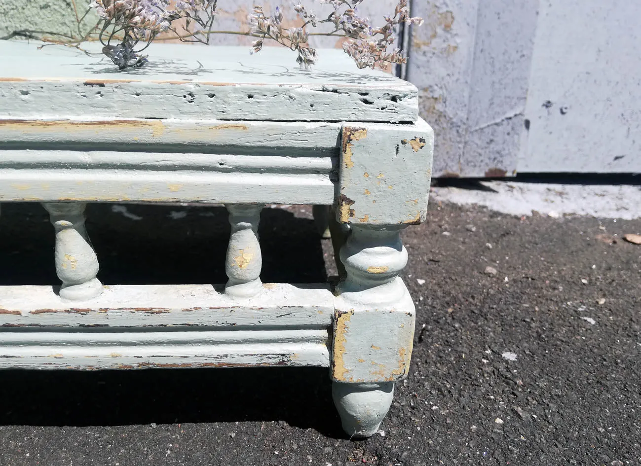 Little step stool painted in chippy layers of Miss Mustard Milk Paint