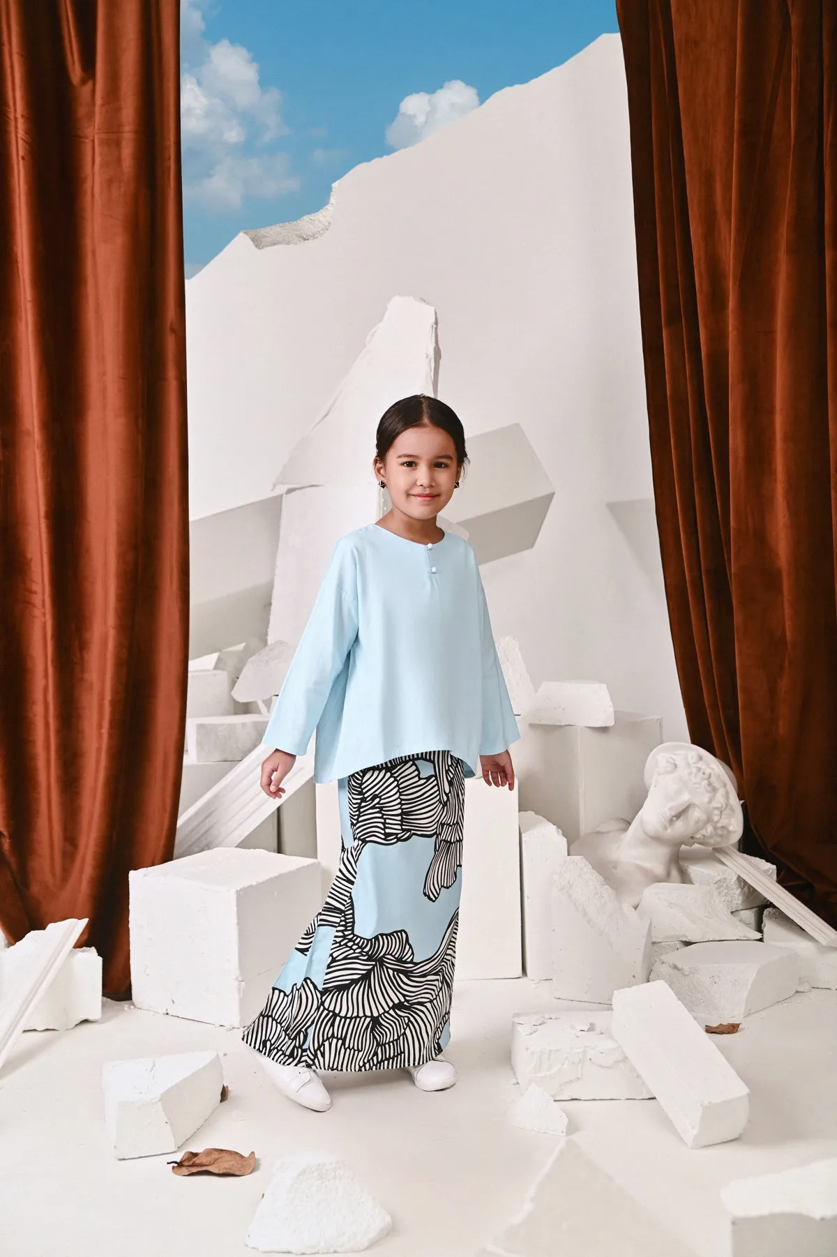 The Kita Menang Back Pleats Skirt - Rise